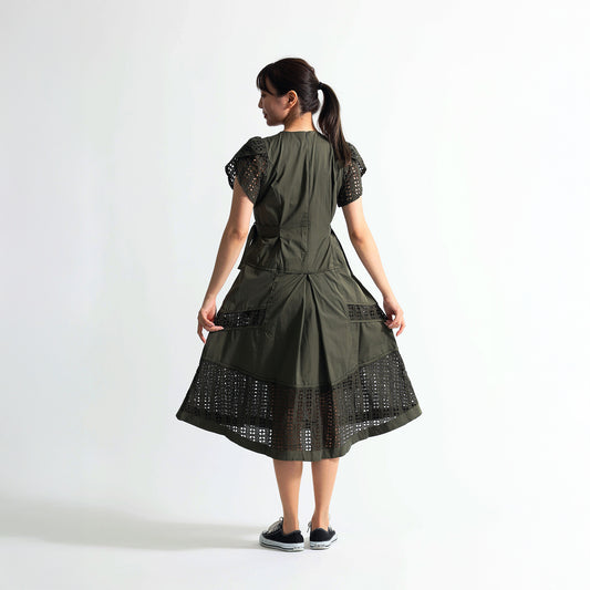 Elegant one-piece dress: Geometric cutwork lace panel with side belt.