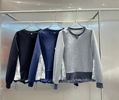 バックボタニカル柄 異素材ドッキング 裾ドロストトップス（全3色）